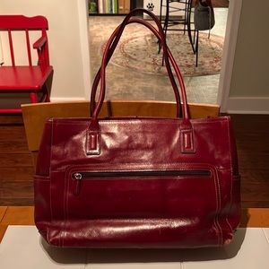 Red leather brief case by Fossil